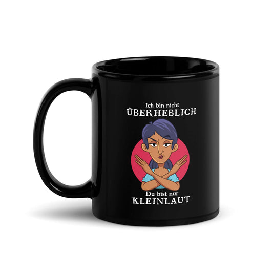 Ich bin nicht überheblich. Du bist nur kleinlaut Black Glossy Mug with humorous design and glossy finish.