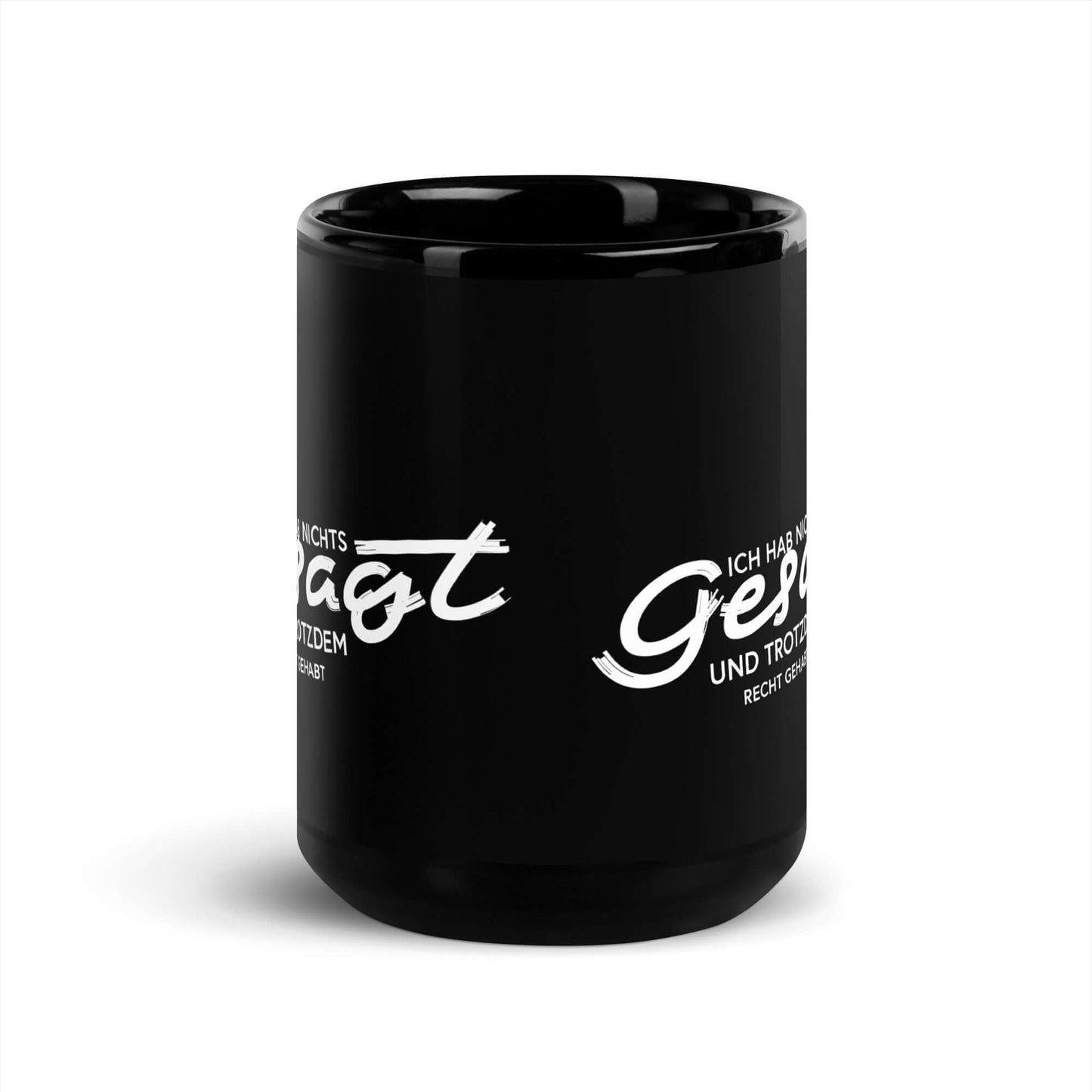 Ich hab nichts gesagt. Und trotzdem recht gehabt Black Glossy Mug with humorous text on a black ceramic surface.