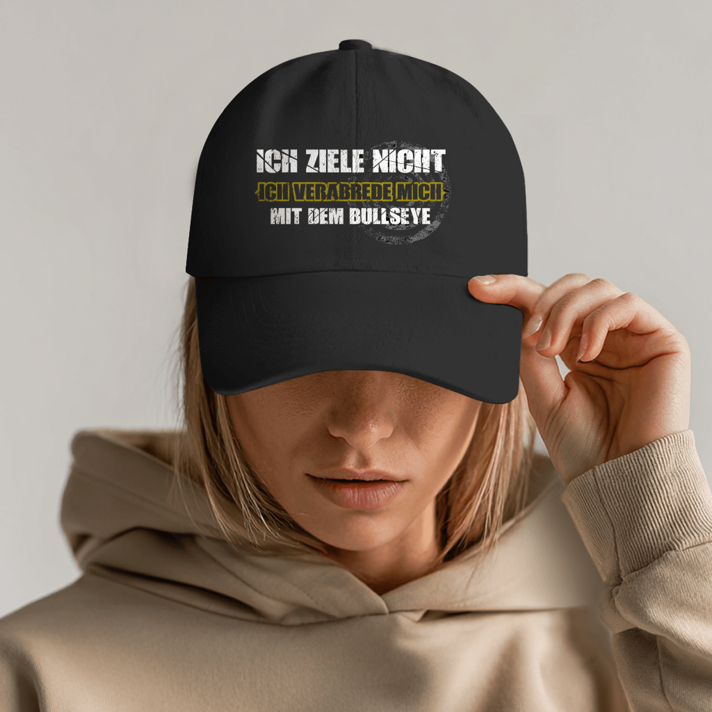 Ich ziele nicht Bio Cap – stylische Baseballmütze mit grungiger Typografie und Dart-Motiv.