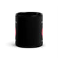 Ich bin nicht überheblich. Du bist nur kleinlaut Black Glossy Mug showing humor and confidence in a sleek design.