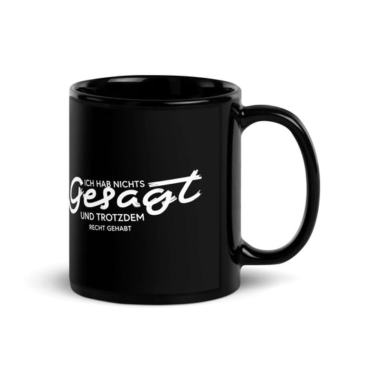 Ich hab nichts gesagt. Und trotzdem recht gehabt Black Glossy Mug with a humorous saying.